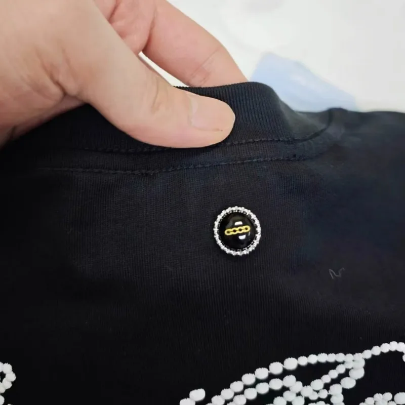 Camiseta con diamantes | Camiseta GOODBRAND Flor Bordada 2026 - Imagen 6